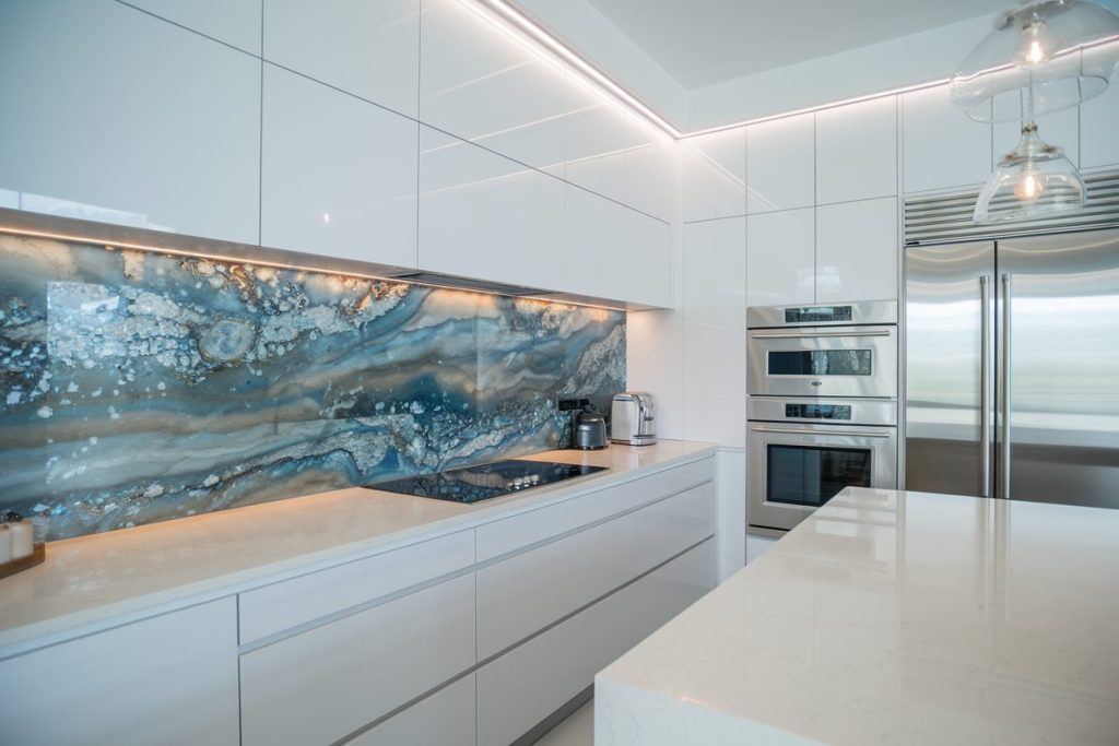 white kitchen with blue pearl granite backsplash ideas