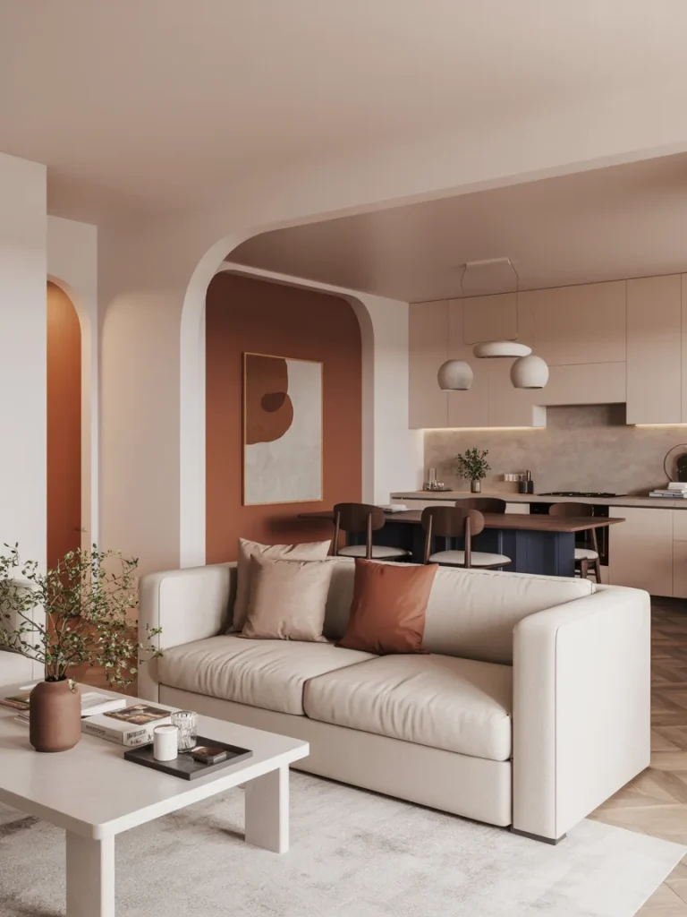 Modern open concept living room with warm terracotta walls, beige sofa, and neutral accents creating a cohesive color palette.
