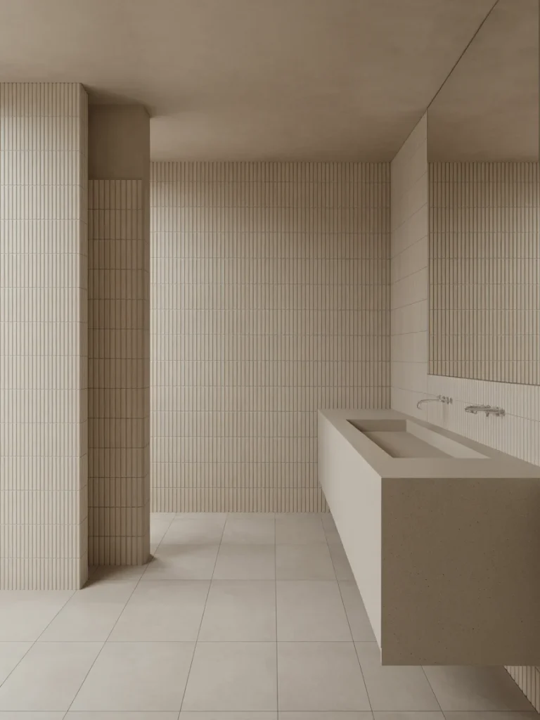 Minimalist bathroom with beige tile flooring, textured wall tiles, and a sleek floating vanity in neutral tones.